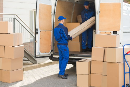 Removal team helping a family move home in Eltham
