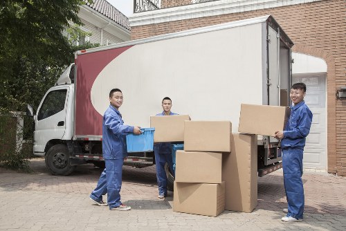Man with van loading furniture in Eltham residential street