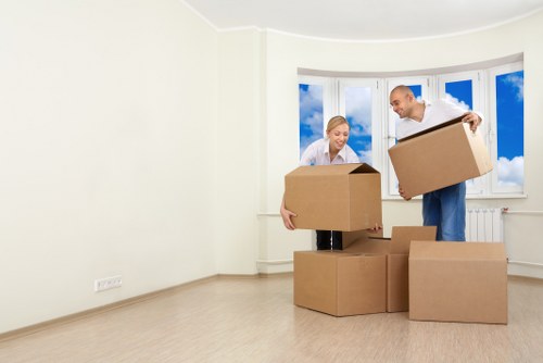 Professional movers unloading furniture at a home in Eltham
