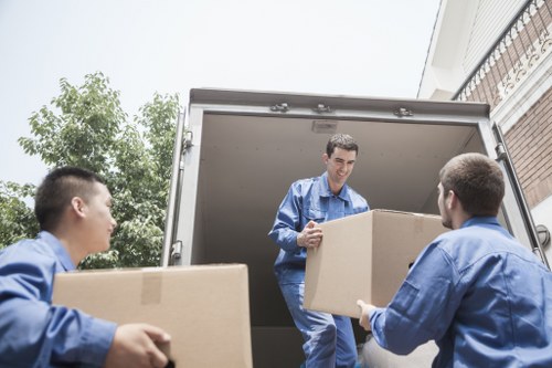 Packed boxes and furniture ready for a home move in Eltham