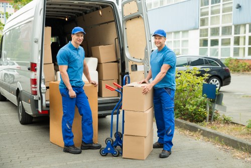 Careful loading of household items for a move in Eltham