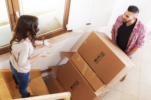 Professional movers handling a flat removal in Eltham
