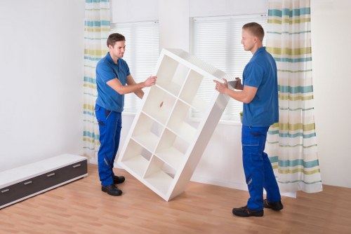 Furniture and boxes prepared for a man and van move